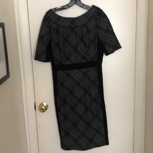 Black and gray plaid dress with mock collar.